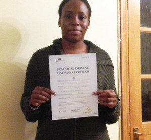 Jennifer with her pratical driving test pass certificate